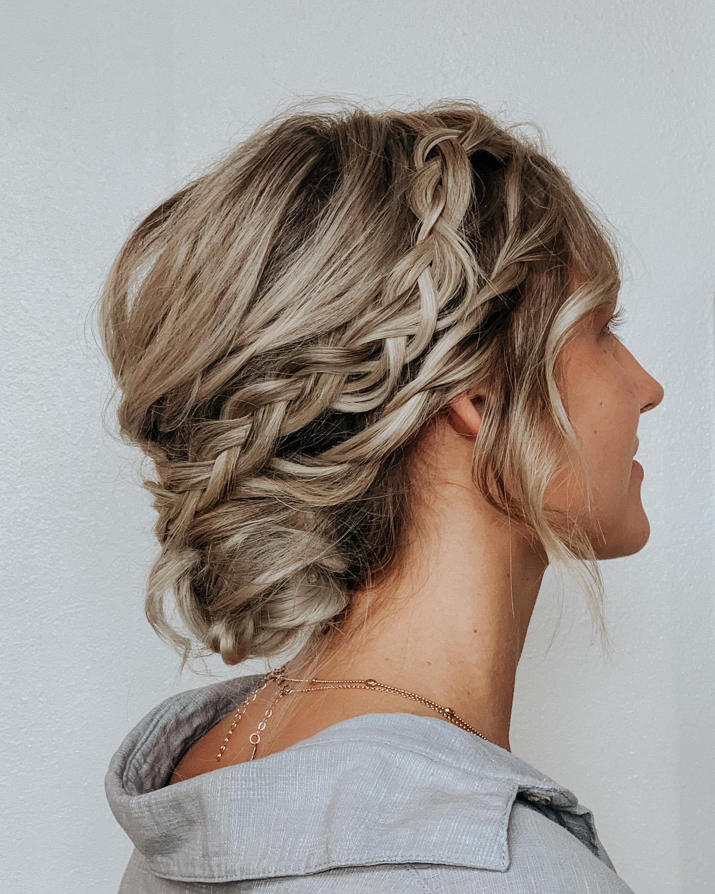 18. Intricate Braided Charm: a Soft Yet Structured Updo