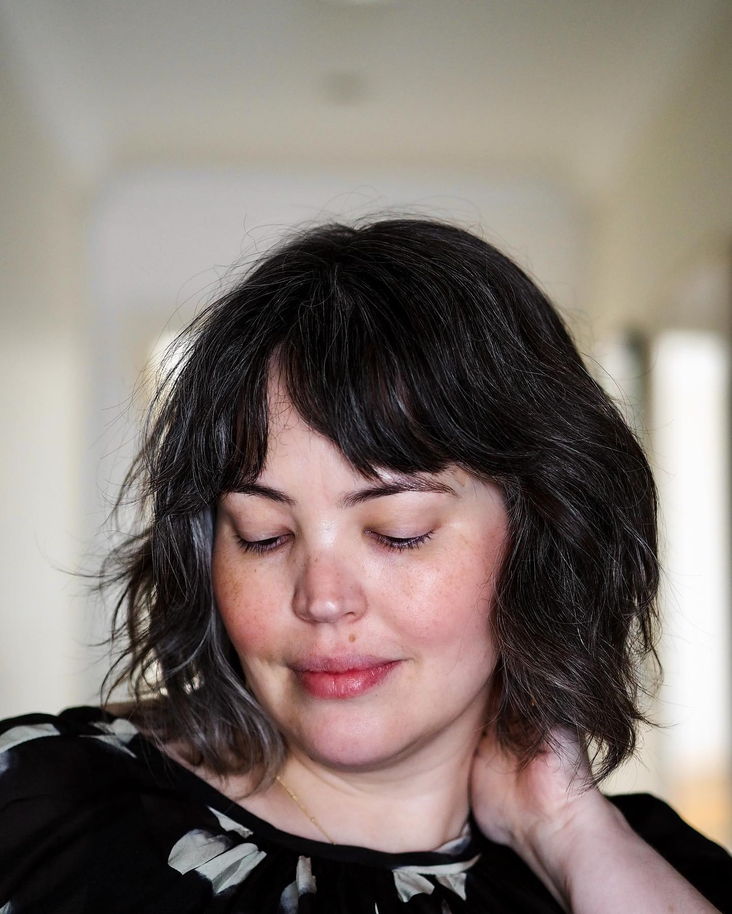 7. Soft Bob with Bangs: Romantic Charm