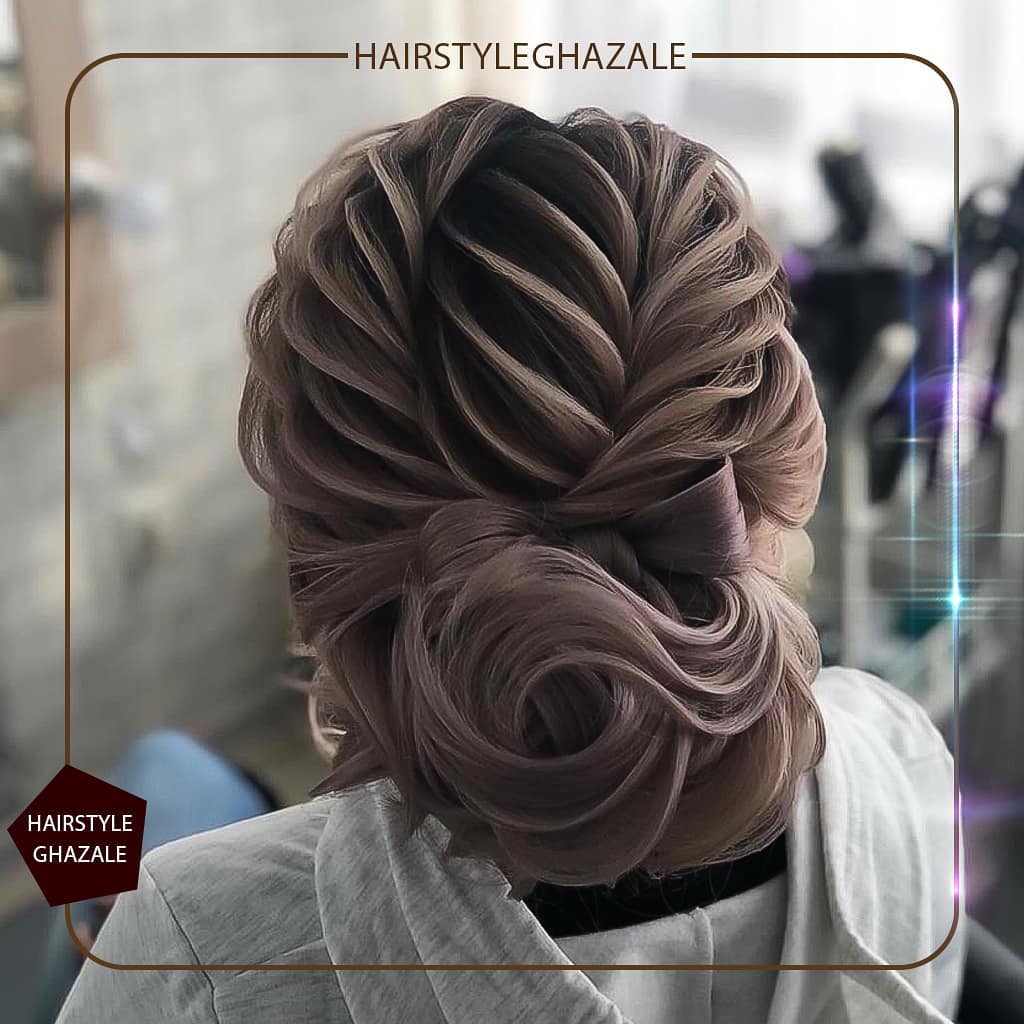 19. Elegantly Twisted: a Textured Updo for the Modern Muse