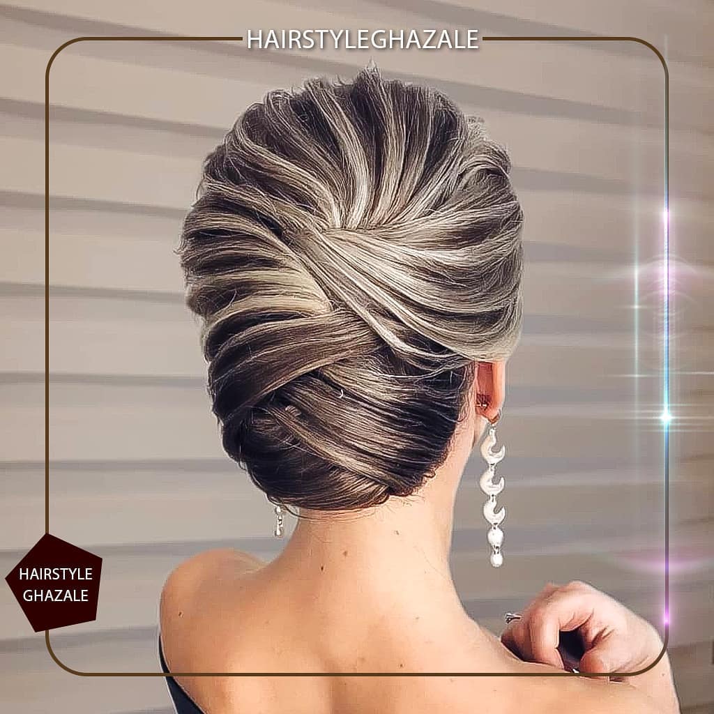 12. Twisted Opulence: a Chic Spiral Updo That Dances with Light