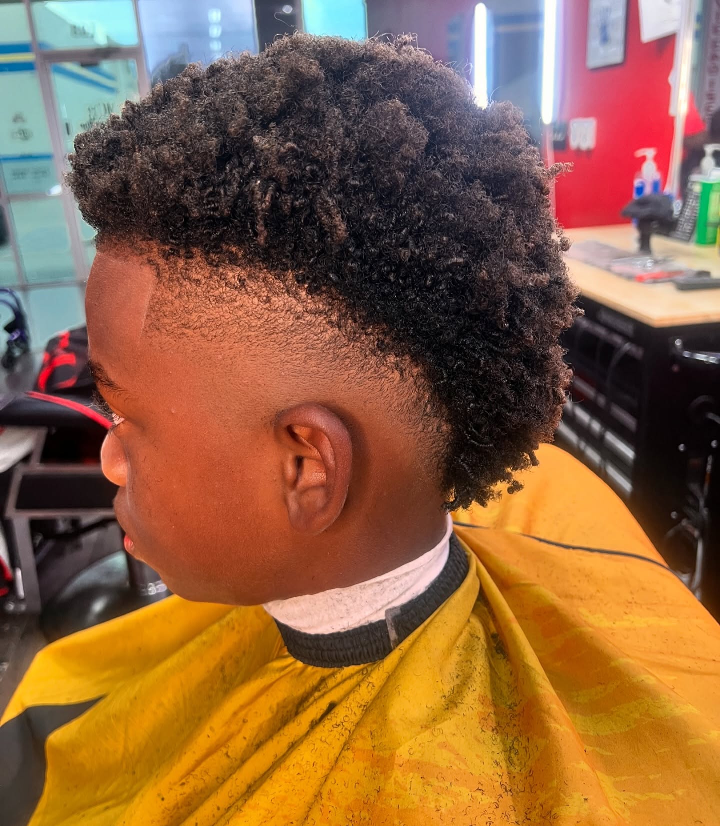 26. Curly Heights with a Modern Fade