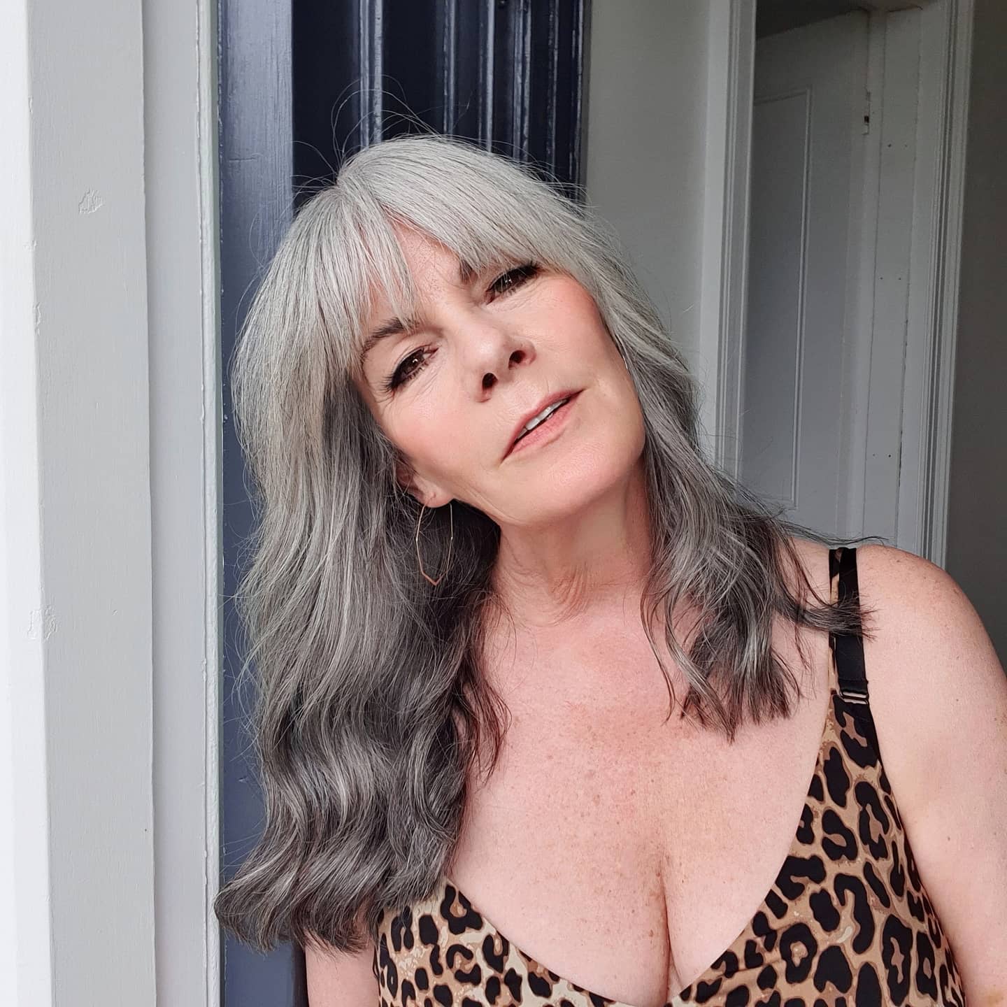 36. Silver Siren with Feathered Layers and Subtle Waves