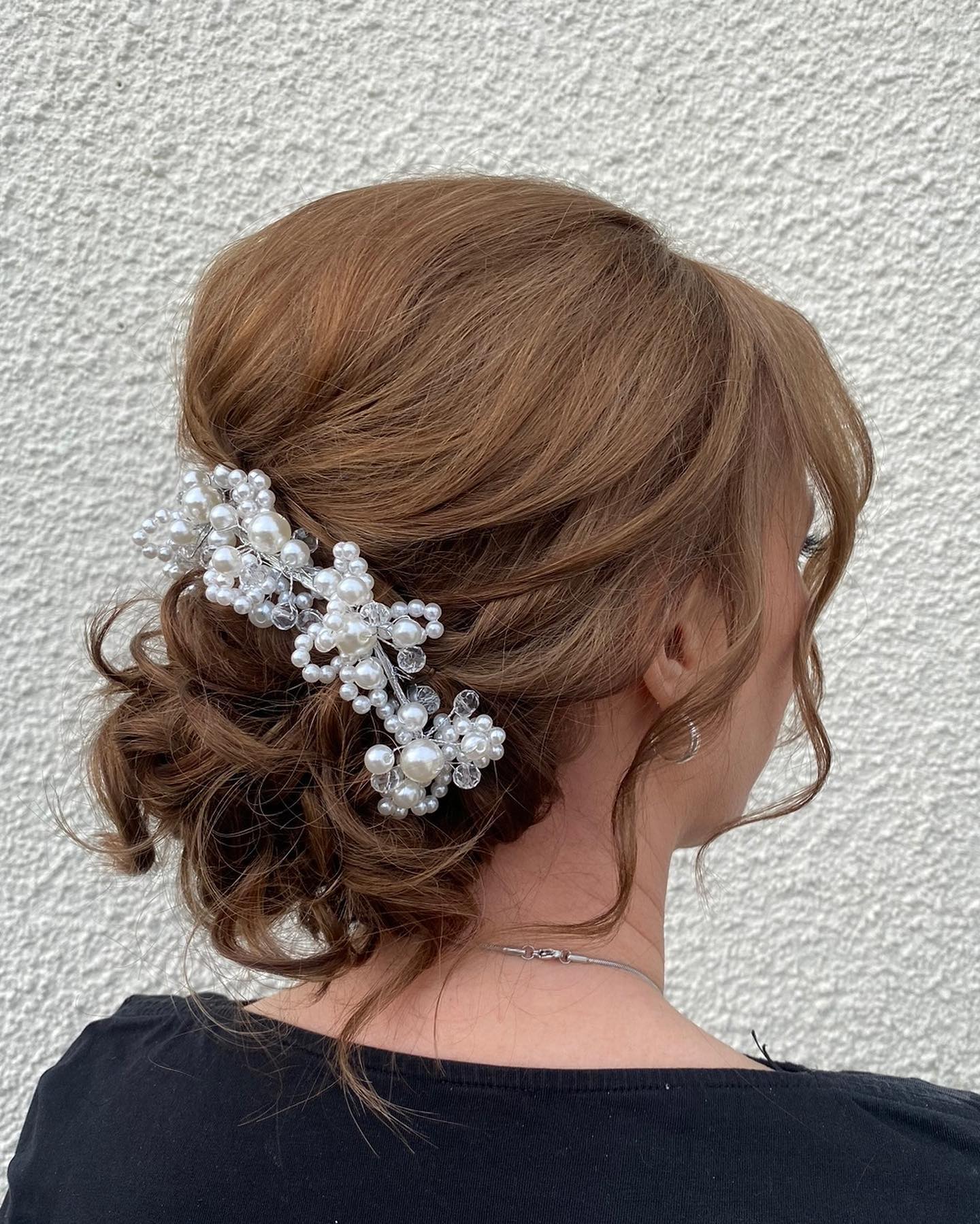 16. Whimsical Elegance: a Pearl-adorned Updo for Timeless Charm