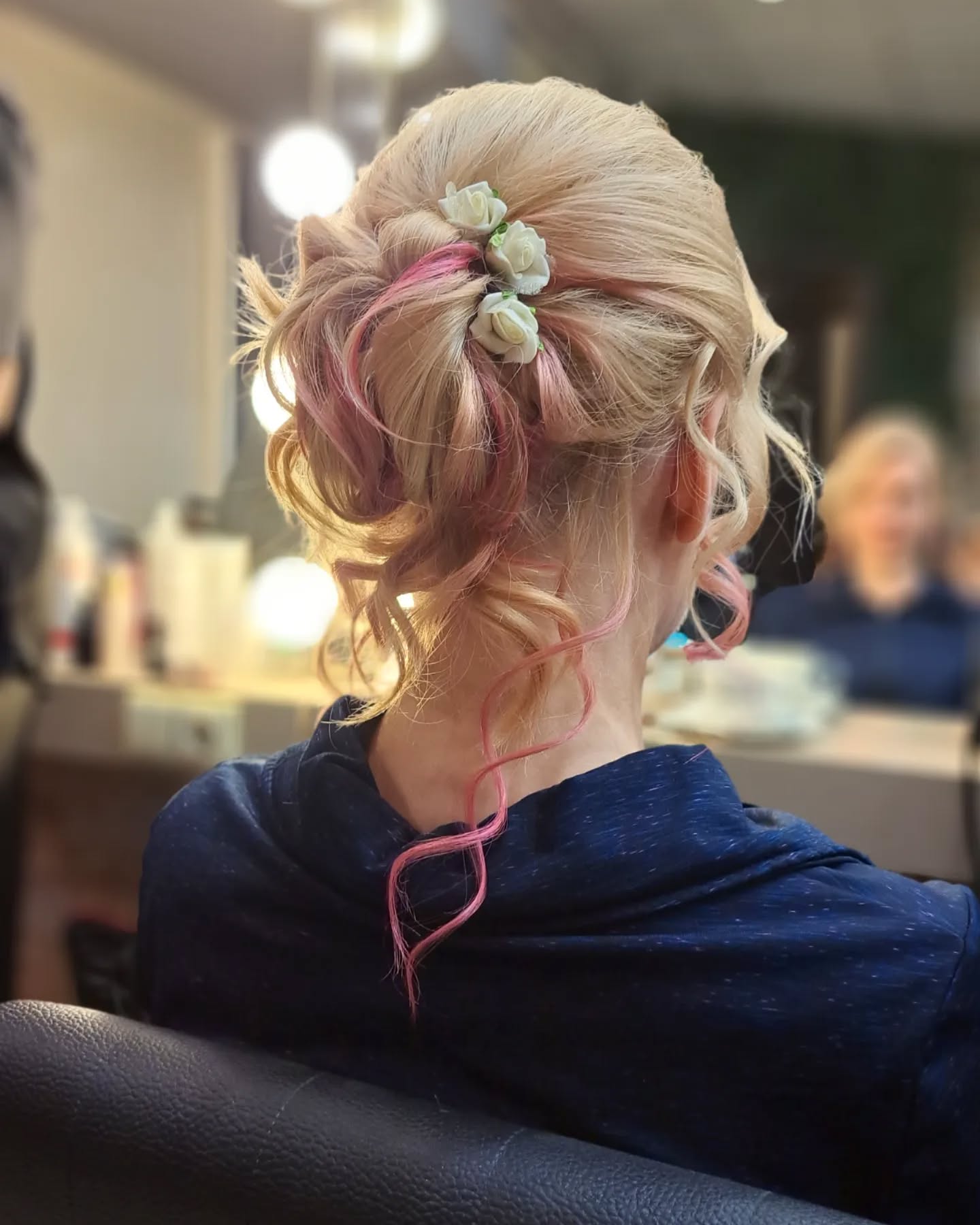 15. Whimsical Elegance: a Soft, Floral-embellished Updo with a Twist Of Color