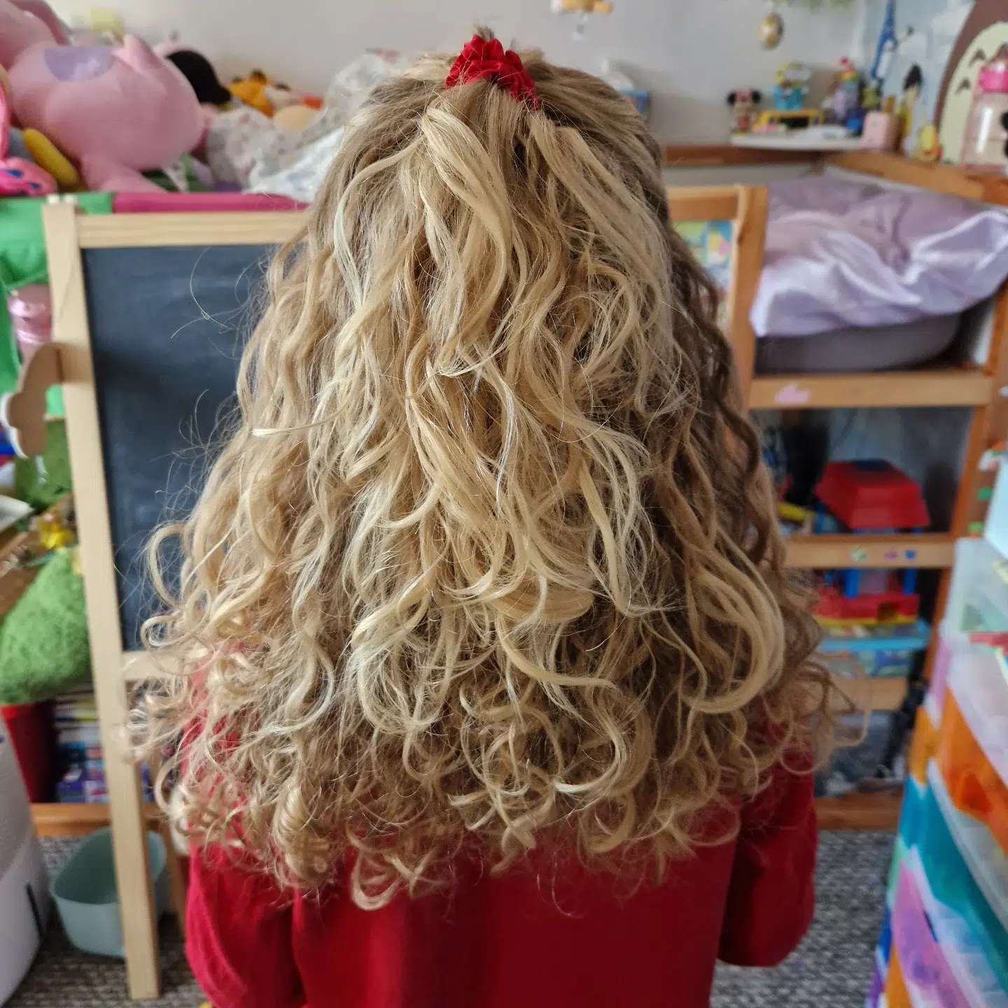 19. Blonde Layered Hairstyle with Curtain Bangs
