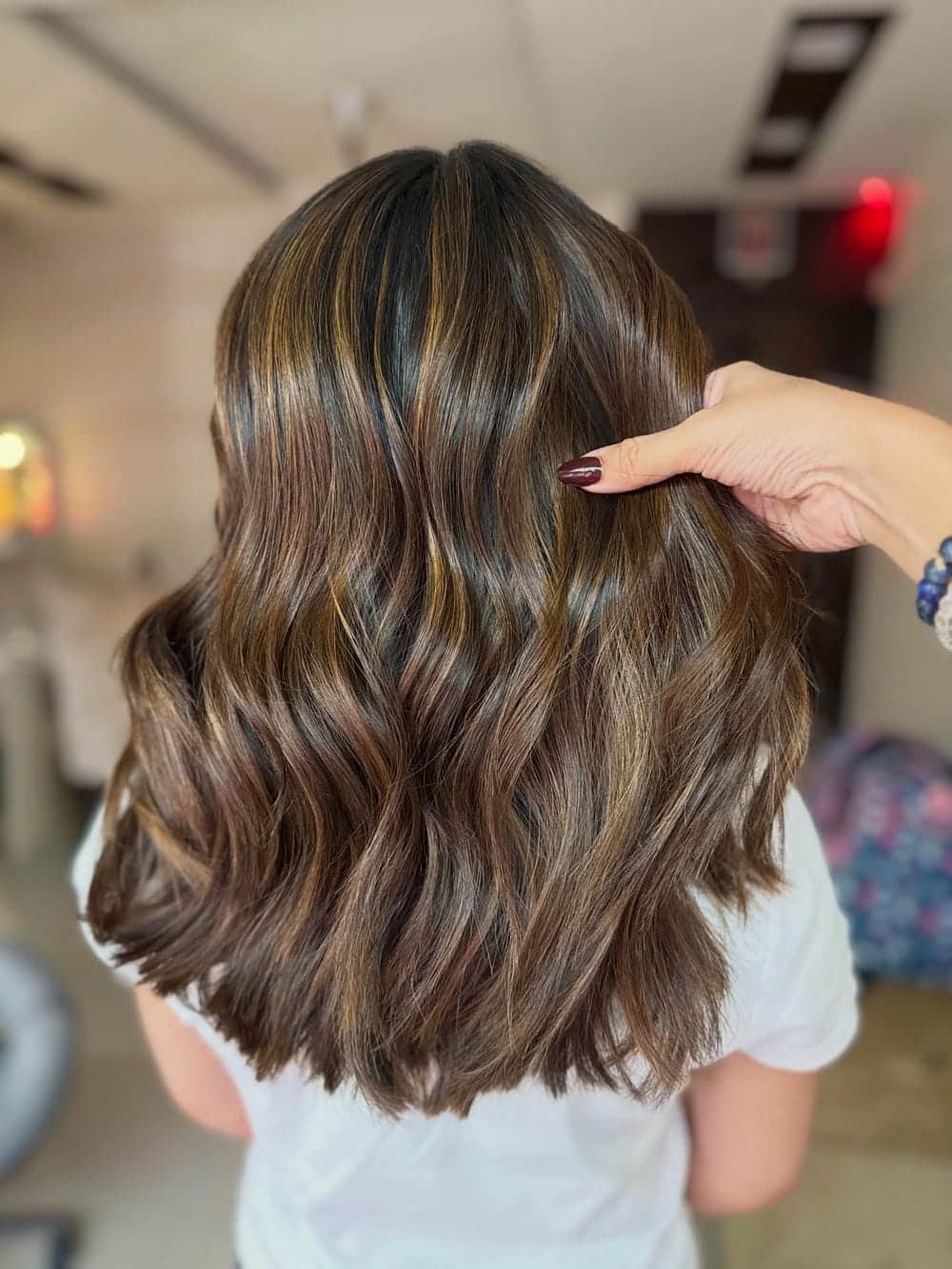 9. Title: Light Brown Waves with Sun-Kissed Highlights