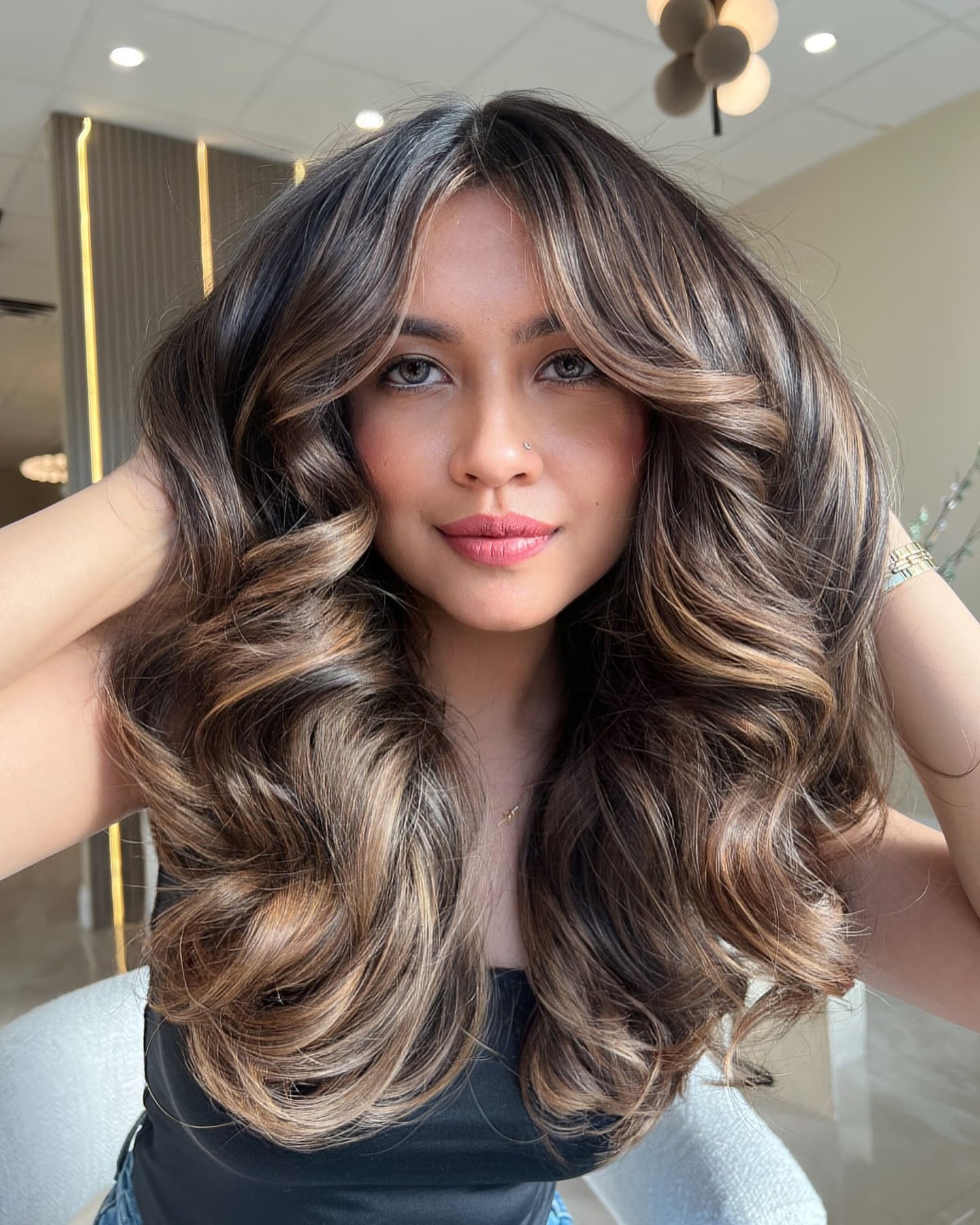 4. Title: Lush Dark Brown Waves with Sun-Kissed Highlights