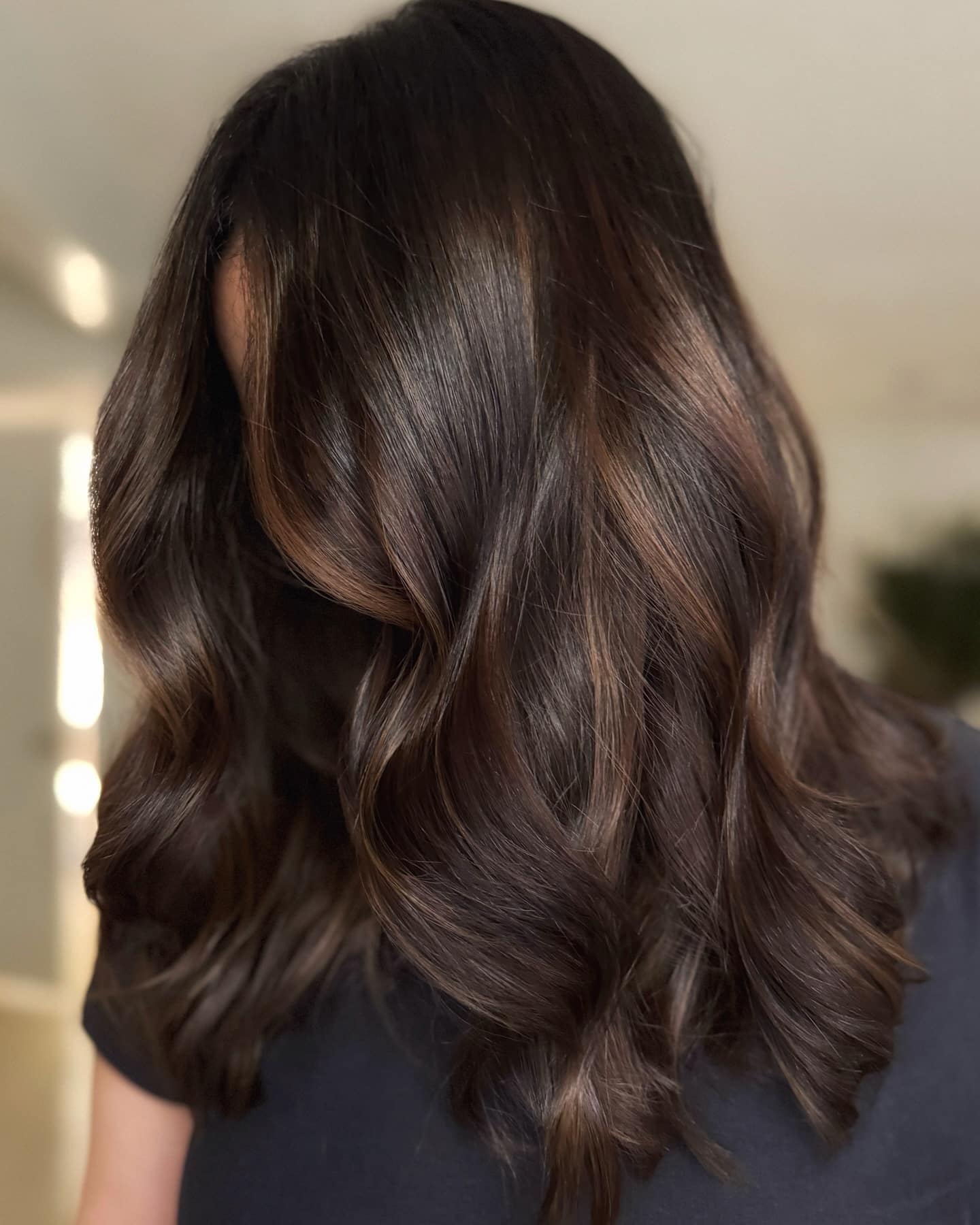 49. Warm Dark Brown Waves with Subtle Highlights