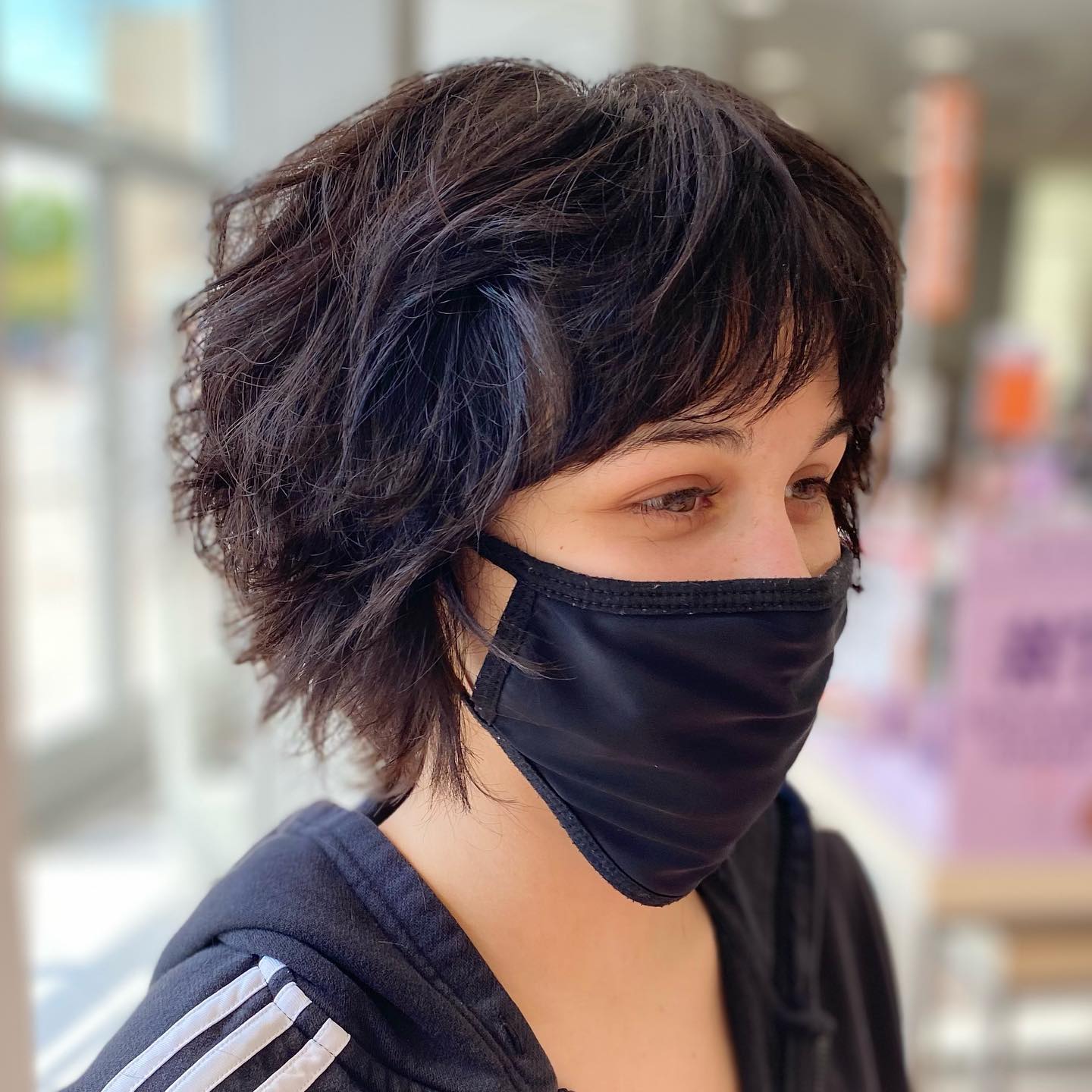 20. Title: Textured Short Wavy Bob with Fringe