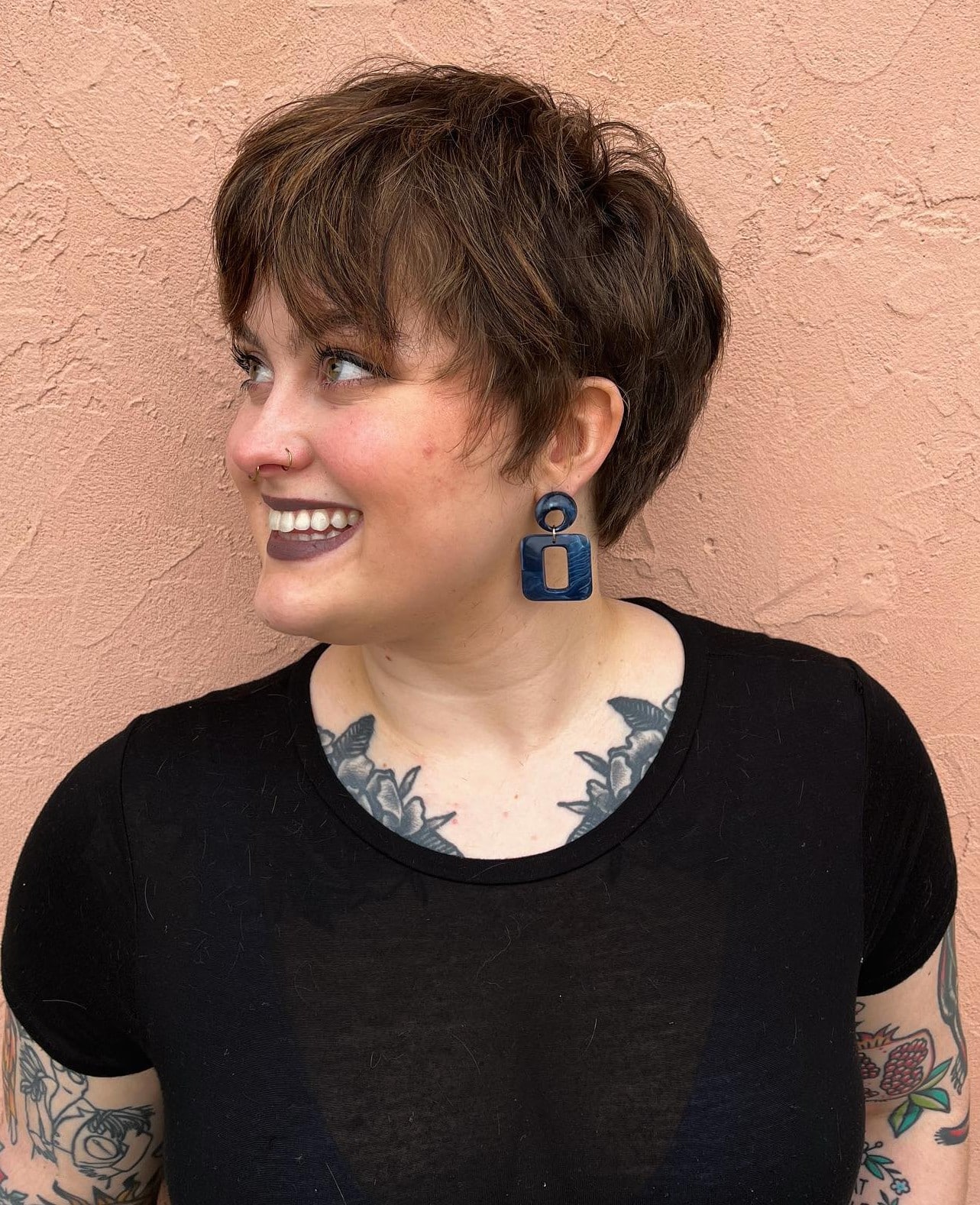 60. Title: Textured Short Cut with Subtle Highlights