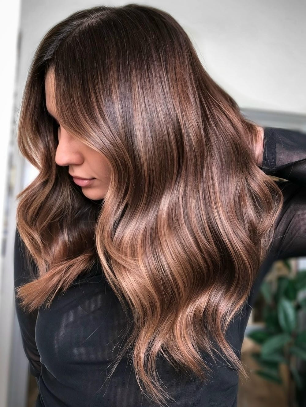 55. Title: Warm Light Brown Hair with Soft Highlights and Lowlights