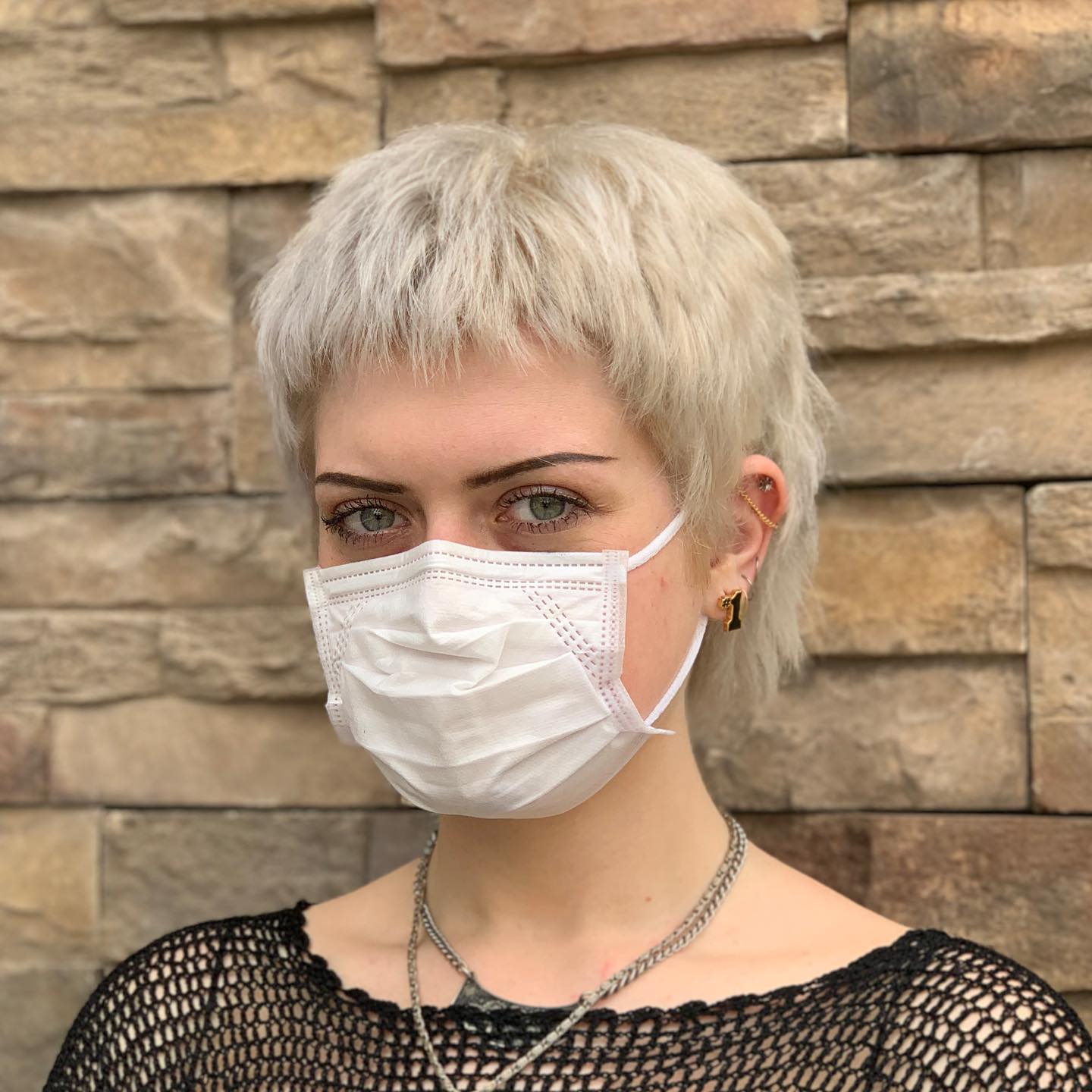 13. Short Textured Wavy Cut with Tapered Edges