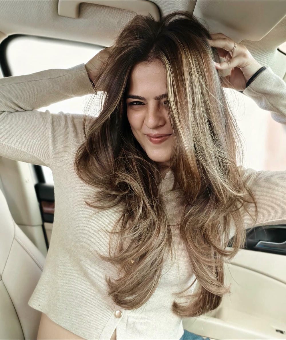 37. Soft Light Brown Hair with Warm Highlights and Lowlights