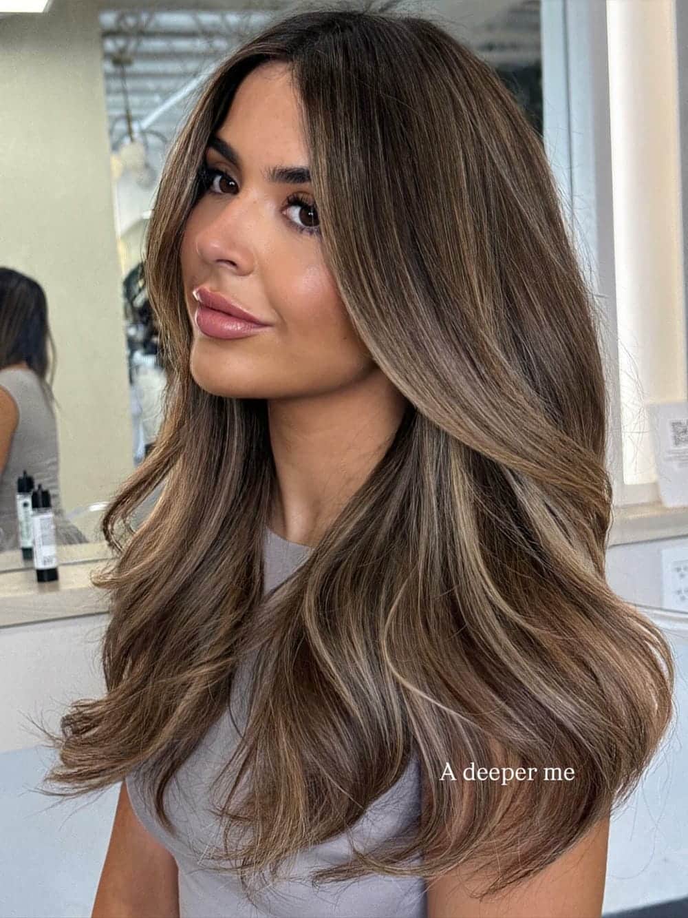 47. Title: Rich Light Brown Hair with Warm Highlights and Lowlights