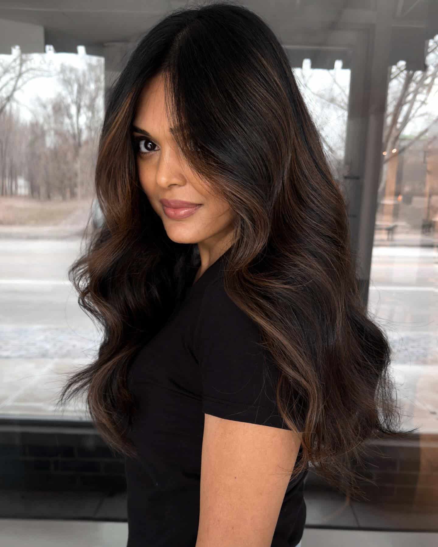 5. Dark Brown Waves with Subtle Caramel Highlights