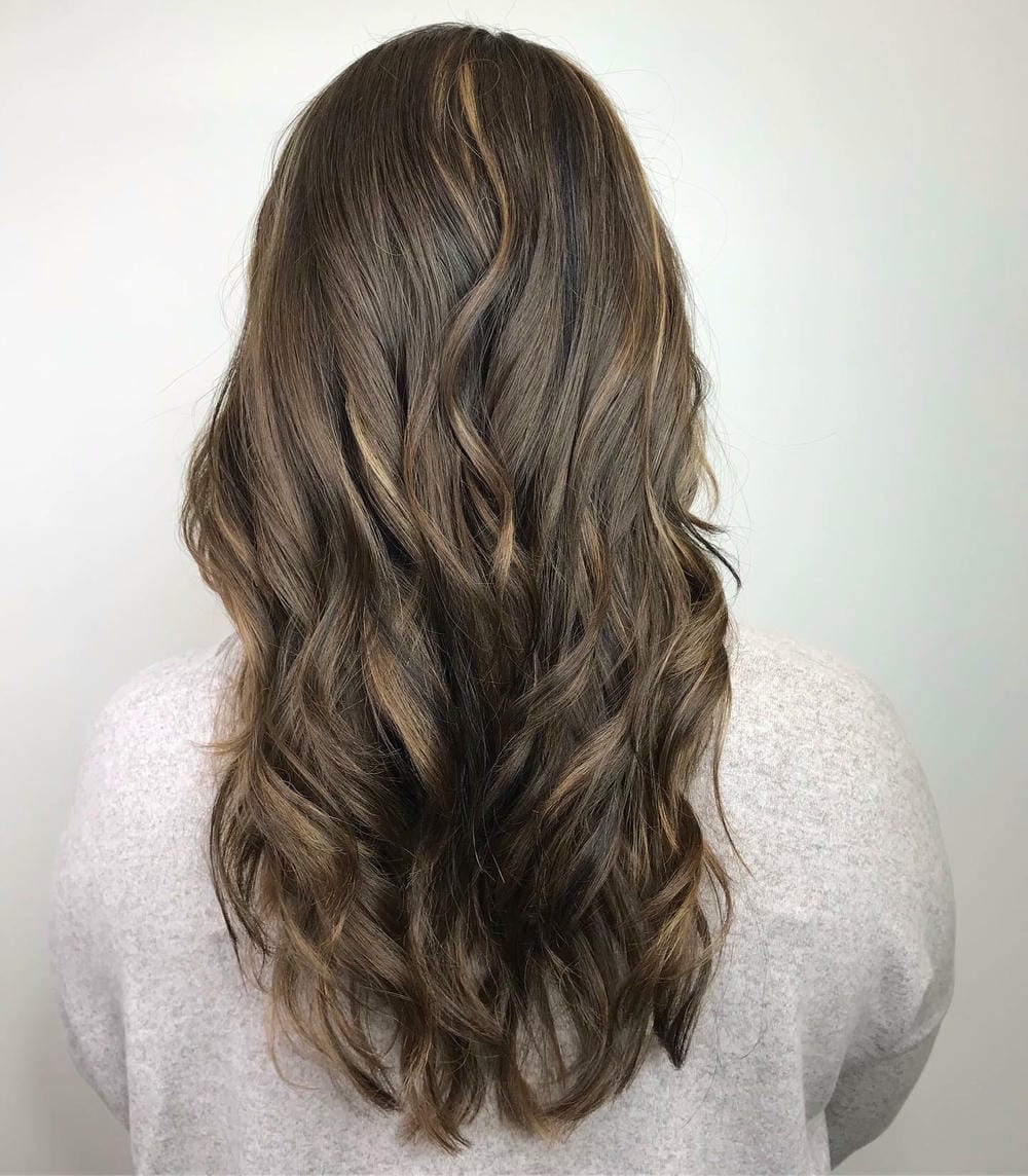 51. Light Brown Waves with Sun-Kissed Highlights