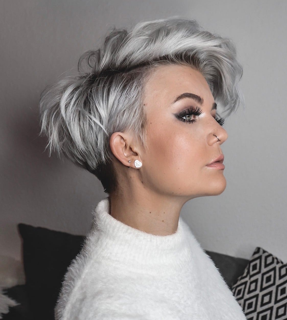 9. Asymmetrical Short Wavy Cut with Silver Highlights