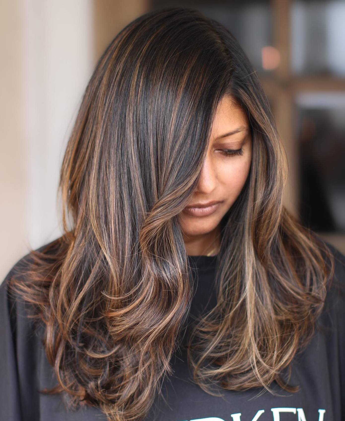 41. Title: Rich Dark Brown with Warm Caramel Highlights