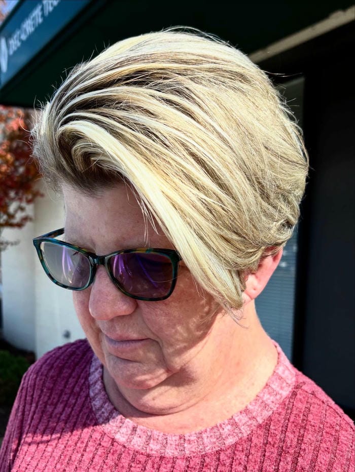 72. Title: Textured Side-Swept Bob with Highlights