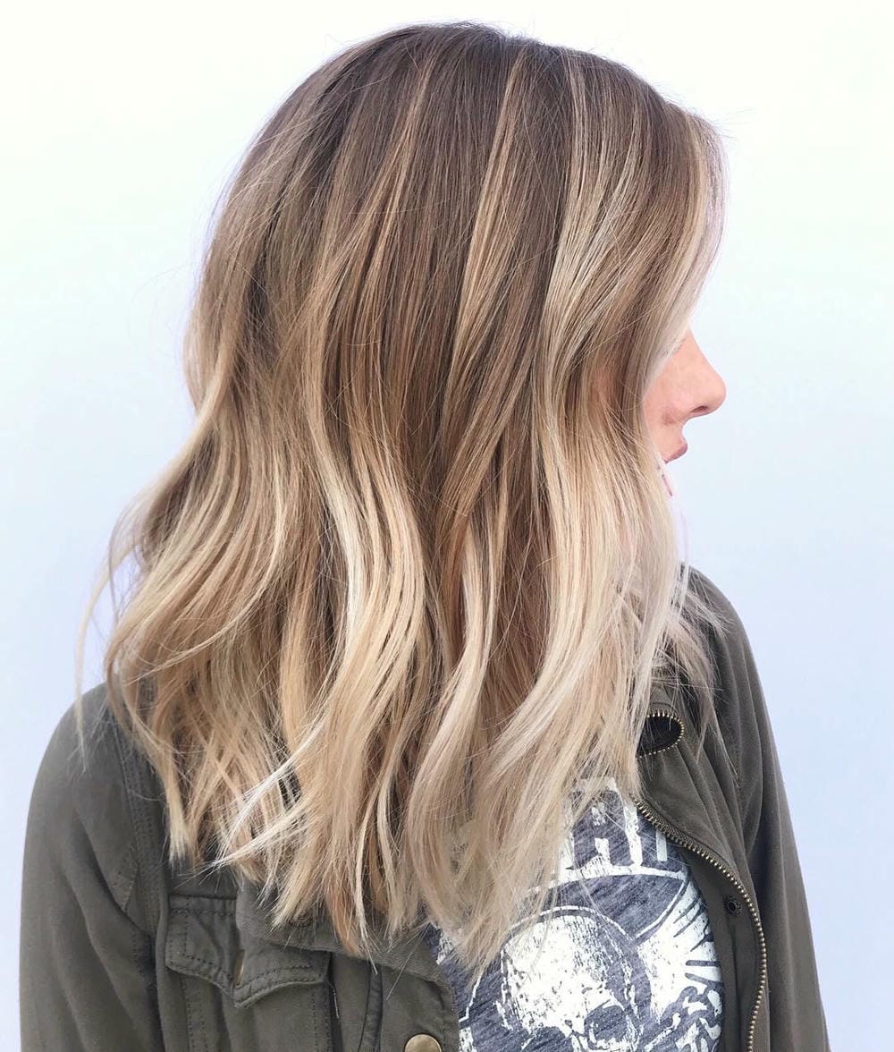 2. Soft Caramel Balayage with Subtle Highlights