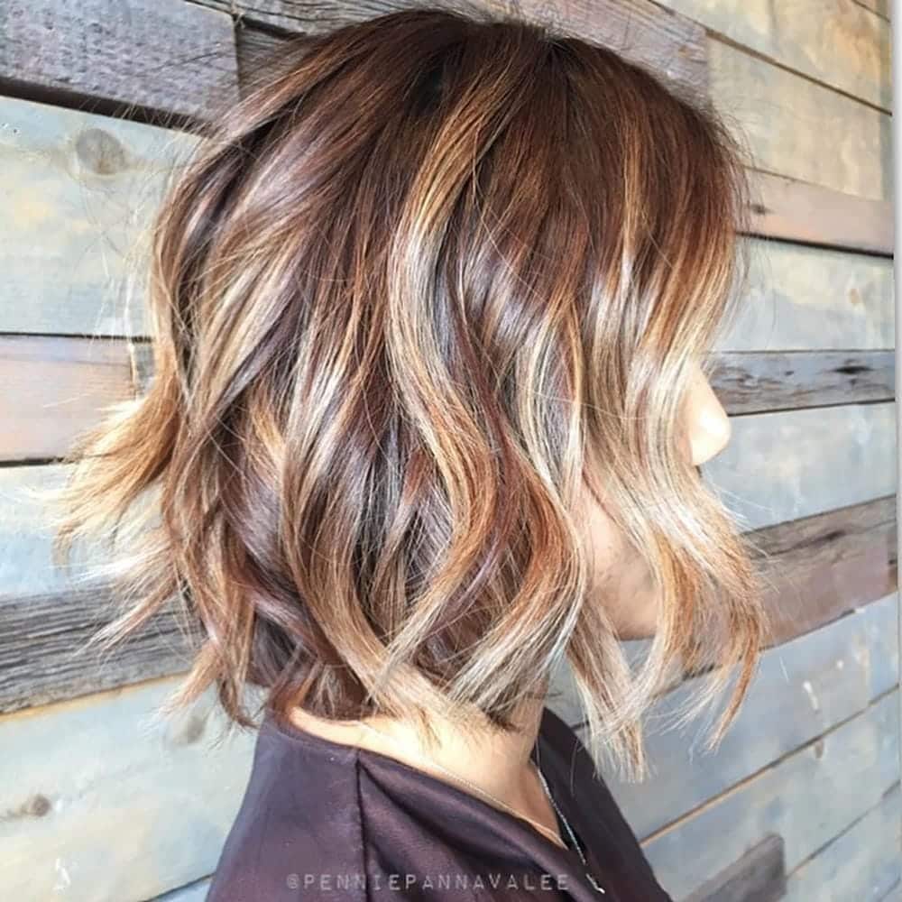 16. Textured Light Brown Bob with Balanced Highlights and Lowlights