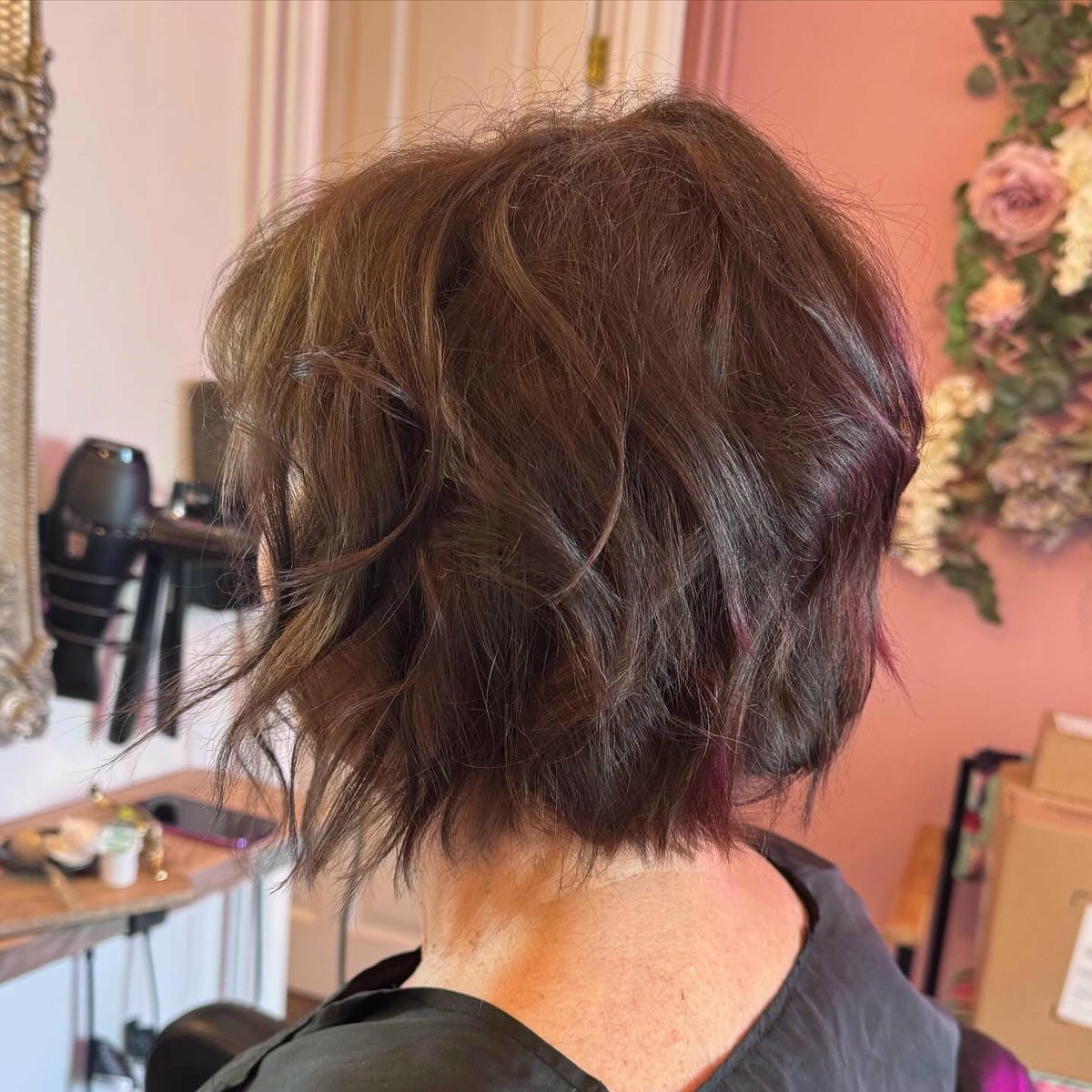 35. Title: Textured Chocolate Brown Bob with Subtle Highlights