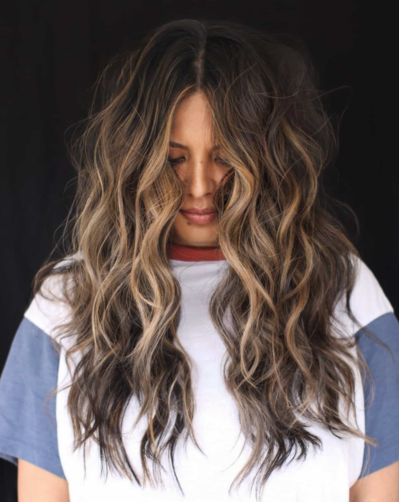 44. Luminous Dark Brown Waves with Sun-Kissed Highlights