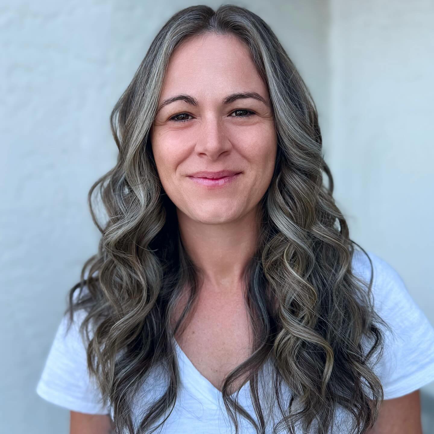 38. Sun-Kissed Dark Brown Waves with Subtle Highlights