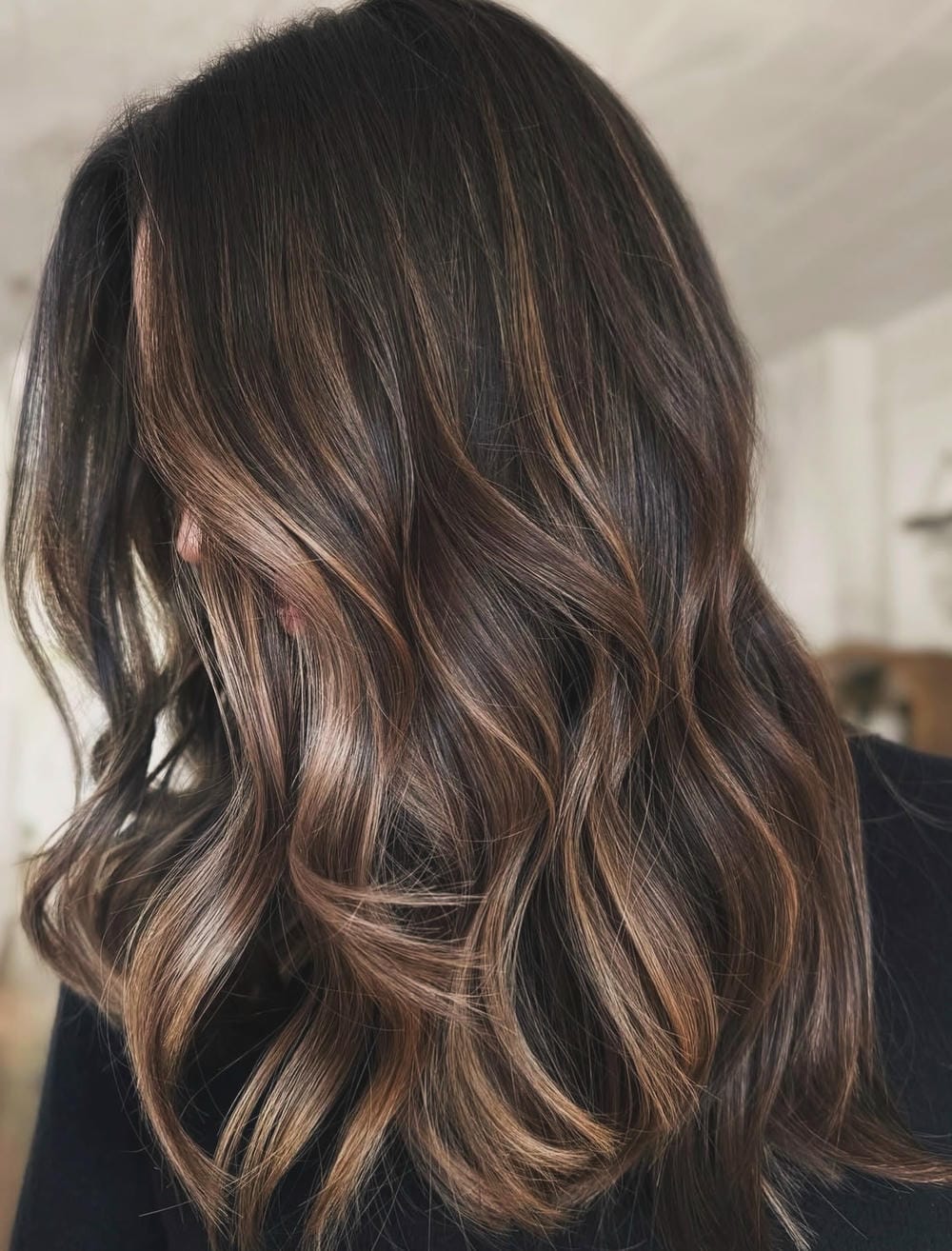 24. Soft Light Brown Waves with Subtle Highlights and Lowlights