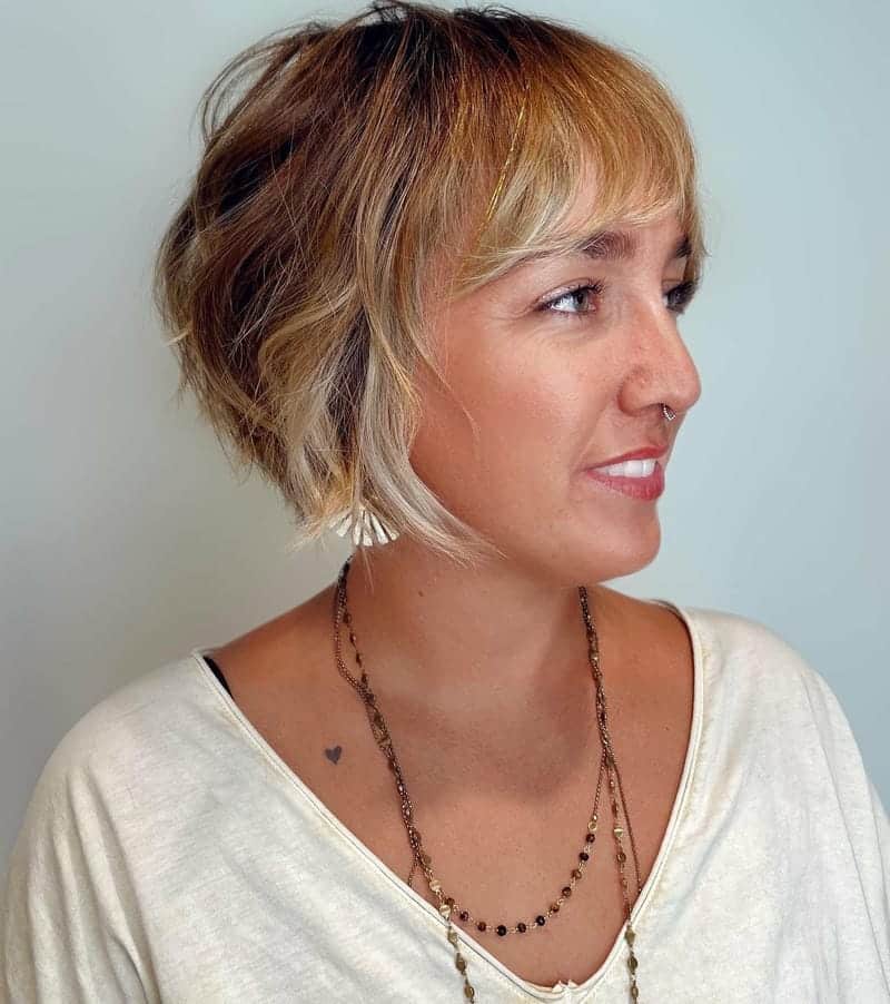 4. Textured Blunt Bob with Subtle Highlights