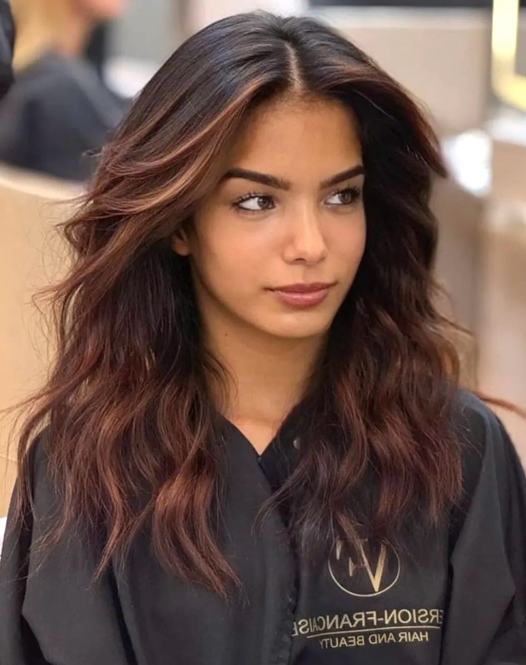 19. Rich Dark Brown Waves with Subtle Highlights