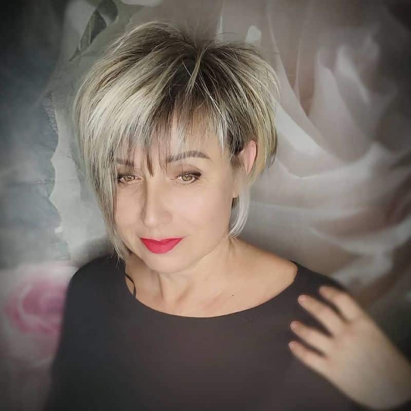 23. Asymmetrical Short Choppy Cut with Highlighted Layers