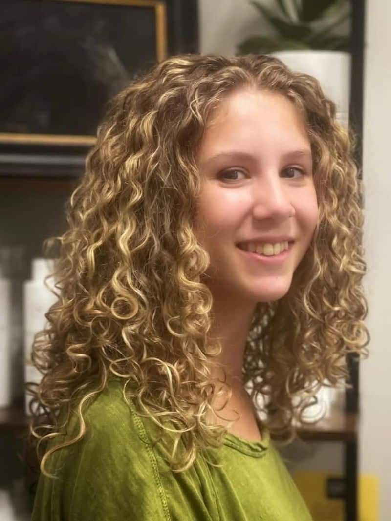 47. Defined Shoulder-Length Curls