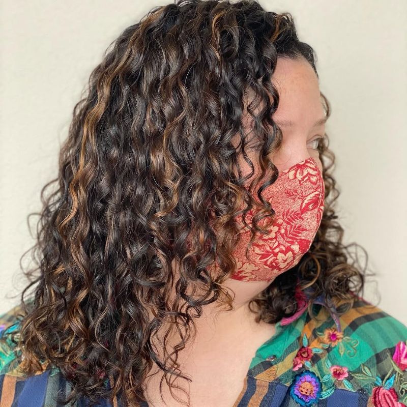 16. Defined Shoulder-Length Curly Layers