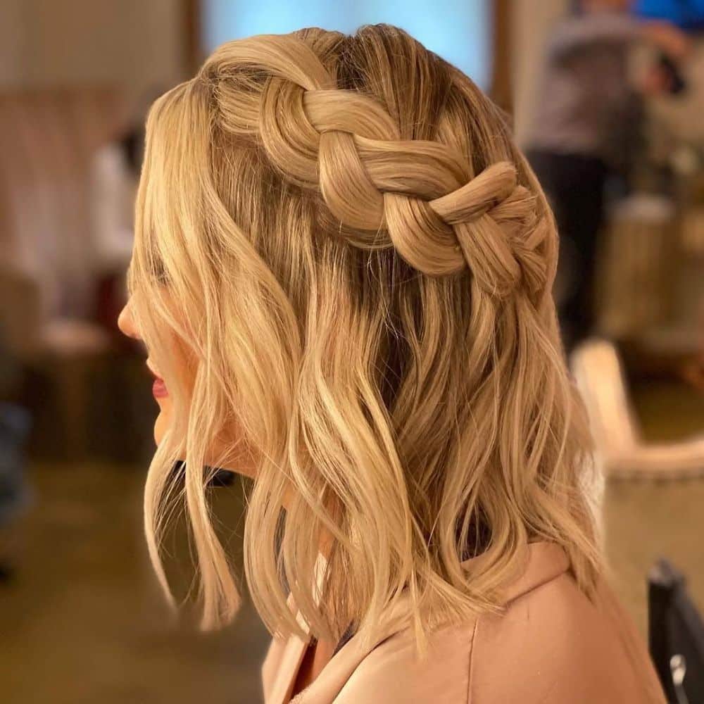 53. Intricate Side Braid Updo