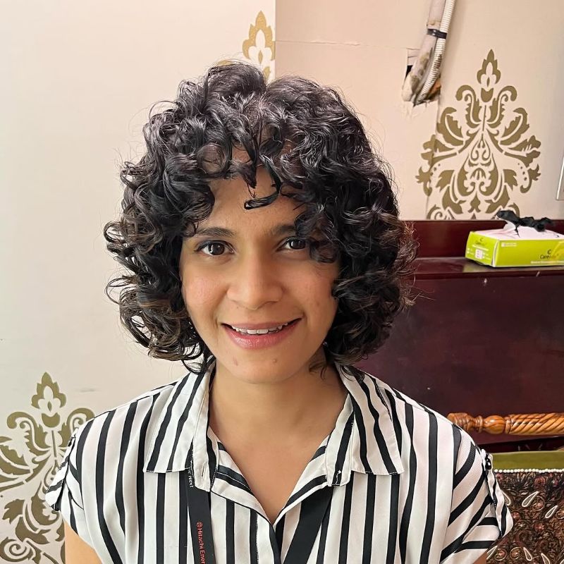 62. Lively Curly Bob with Soft Framing