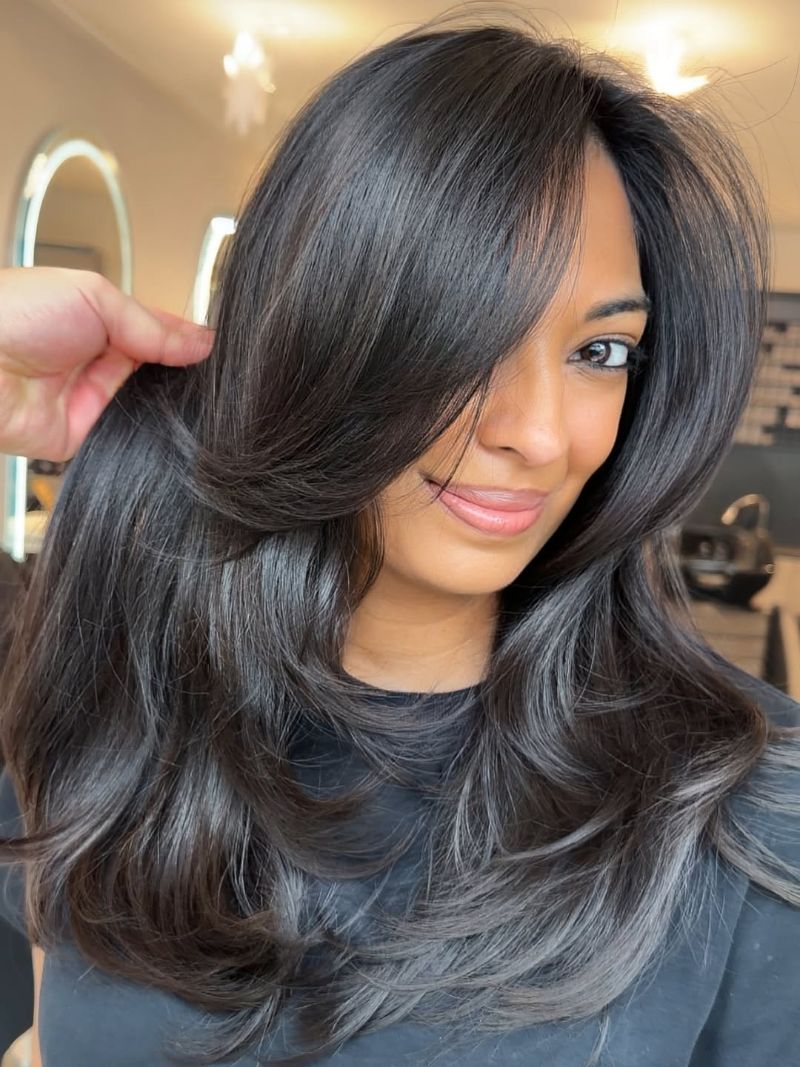 28. Long Layers with Soft Bangs