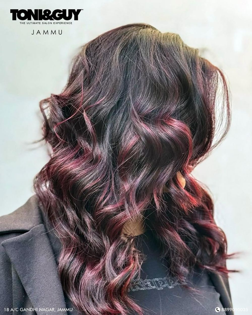 60. Rich Burgundy Waves with Luminous Highlights