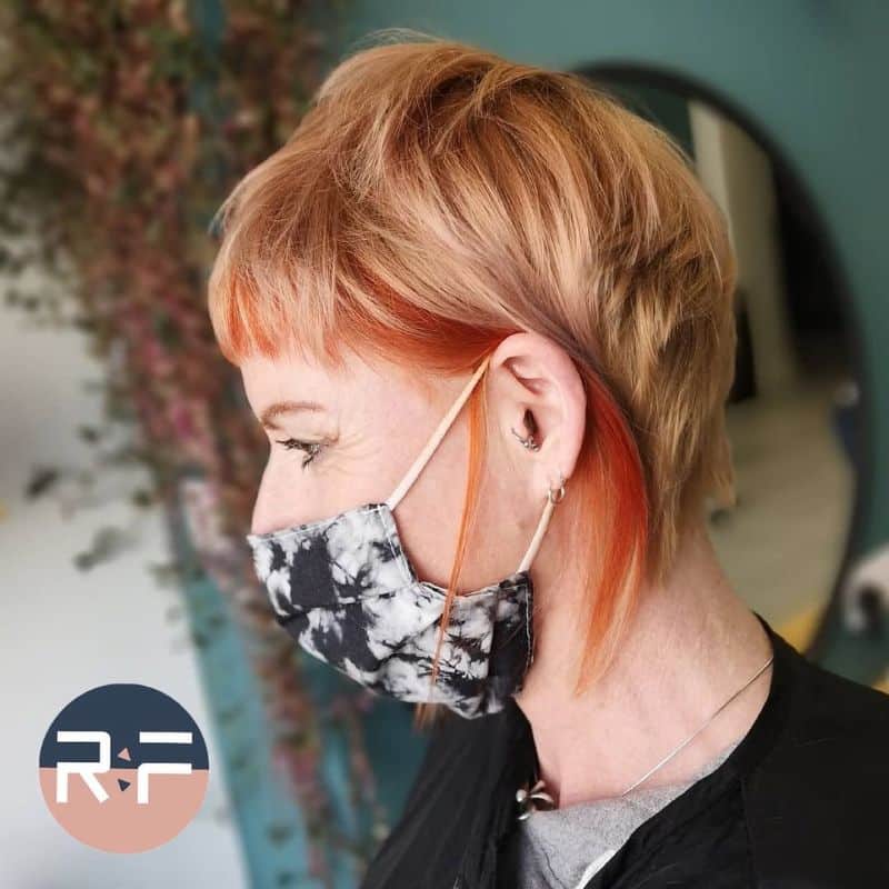 68. Short Choppy Asymmetrical Style with Vibrant Highlights