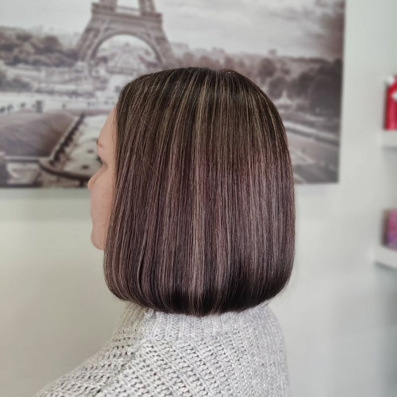 60. Sleek Blunt Medium Bob with Subtle Highlights
