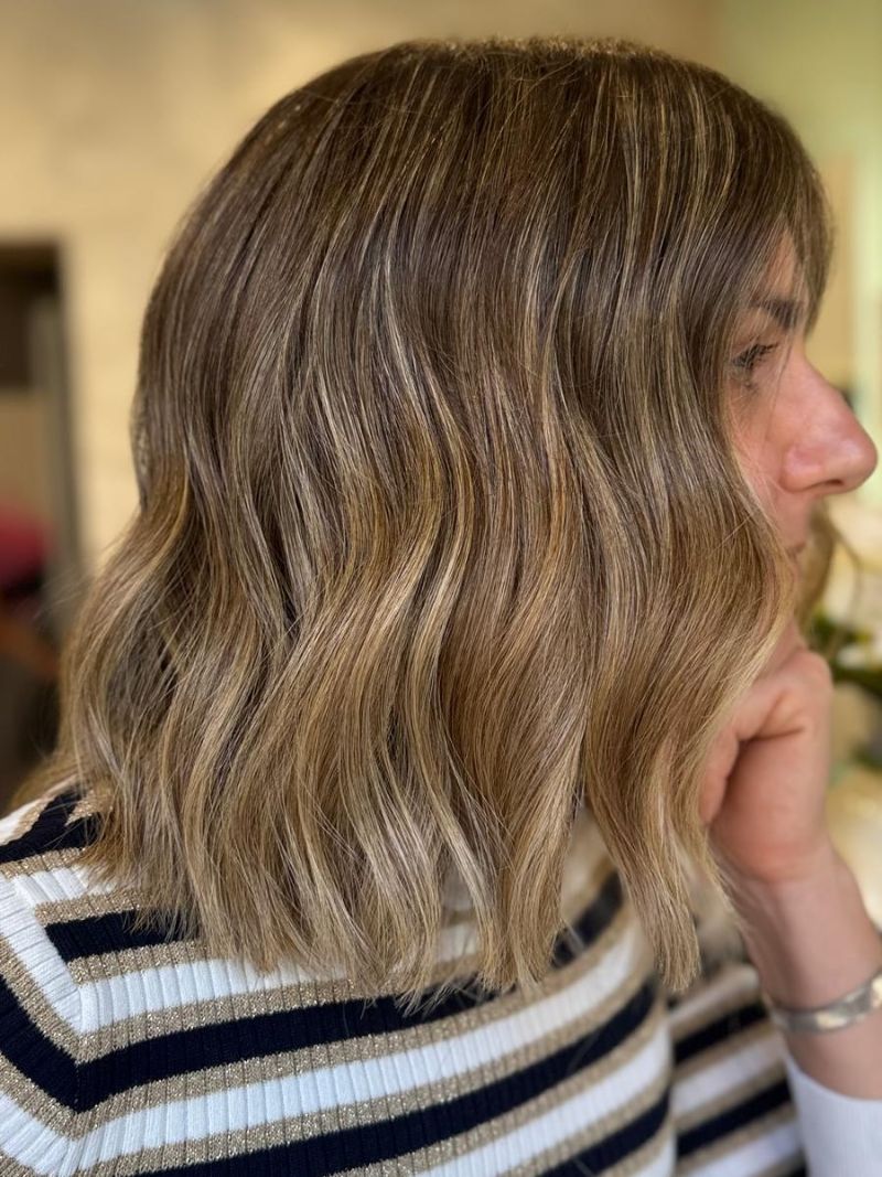 61. Soft, Beachy Medium Bob with Subtle Highlights