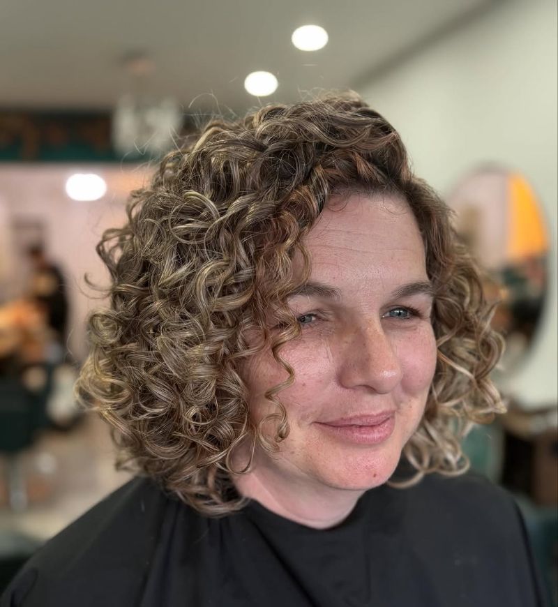 50. Soft Curly Bob with Defined Curls