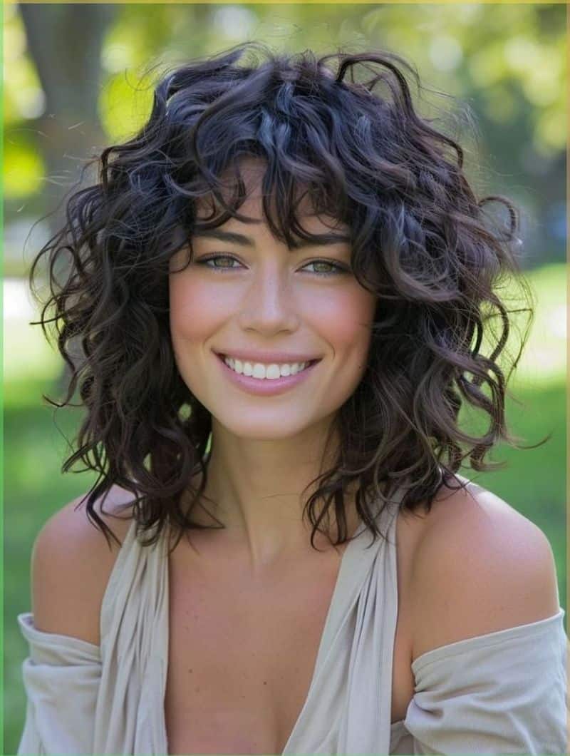 38. Soft, Layered Curly Bob