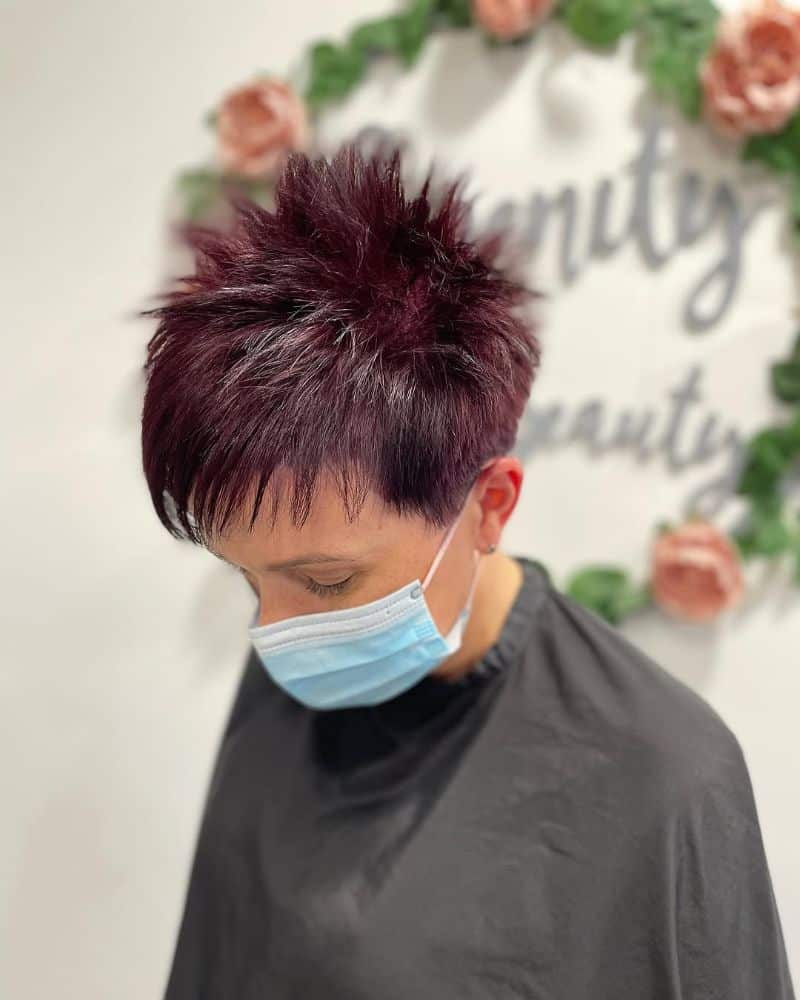 33. Spiky Short Cut with Deep Plum Highlights