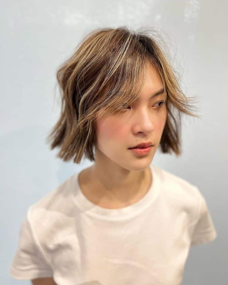 3. Textured Medium Bob with Subtle Highlights