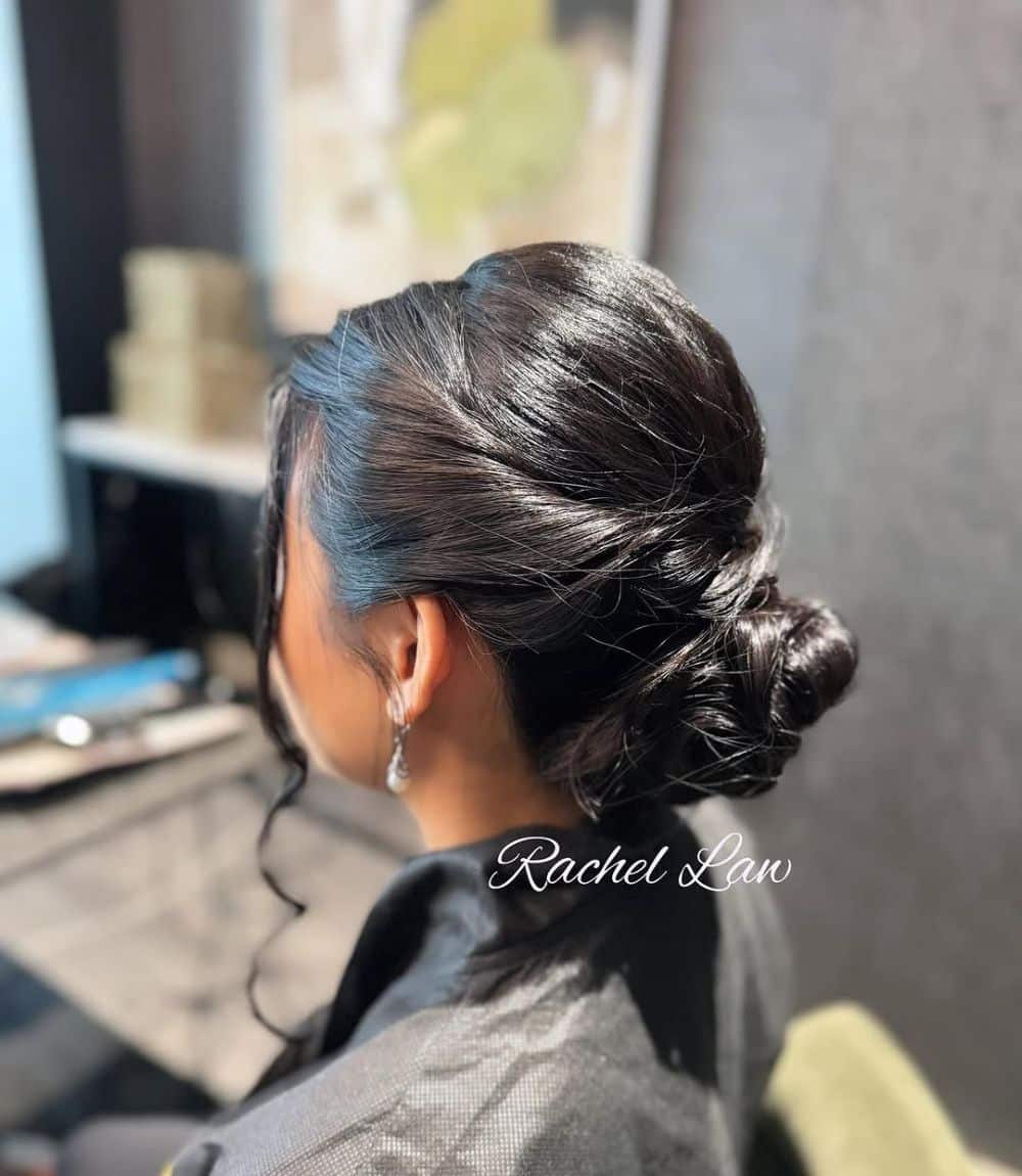 17. Twisted Low Bun with Soft Face Framing