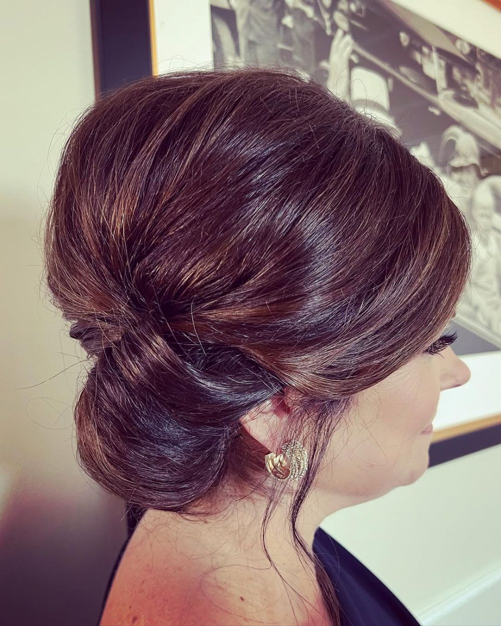 25. Twisted Low Bun with Subtle Volume