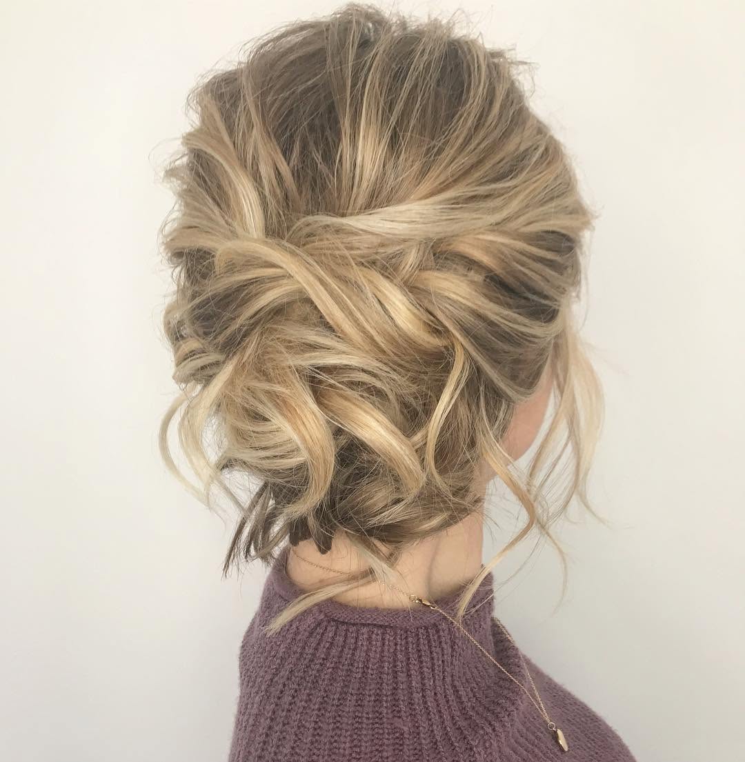 40. Twisted Messy Bun with Loose Strands