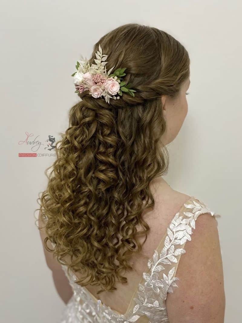 39. Romantic Half-Up Half-Down with Floral Accents