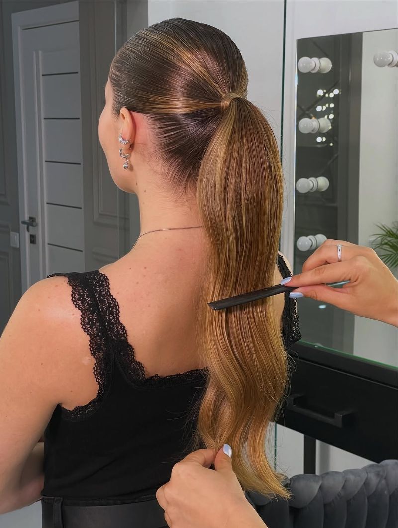 9. Sleek Mid-Length Ponytail